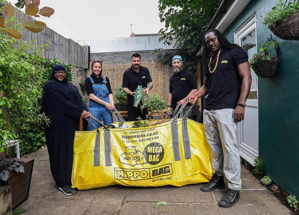 Michael Perry, aka Mr Plant Geek, with staff of Oak House who won the HIPPO garden makeover prize