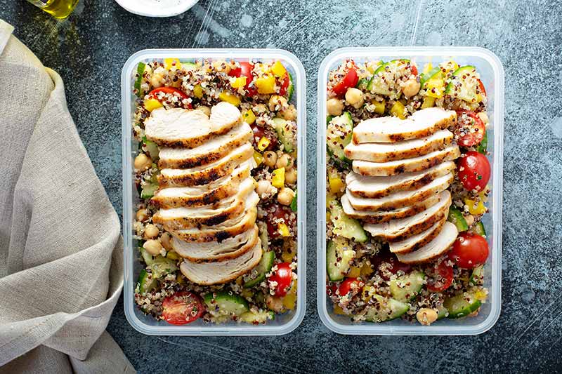 Chicken and vegetables meal prepped into containers for fridge storage ready to eat later