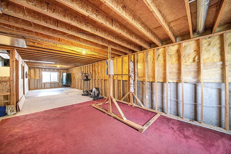 Basement with a repurposed old carpet fitted