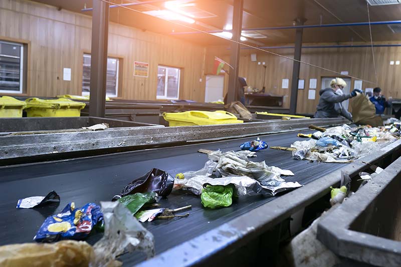 A waste sorting line in a recycling facility