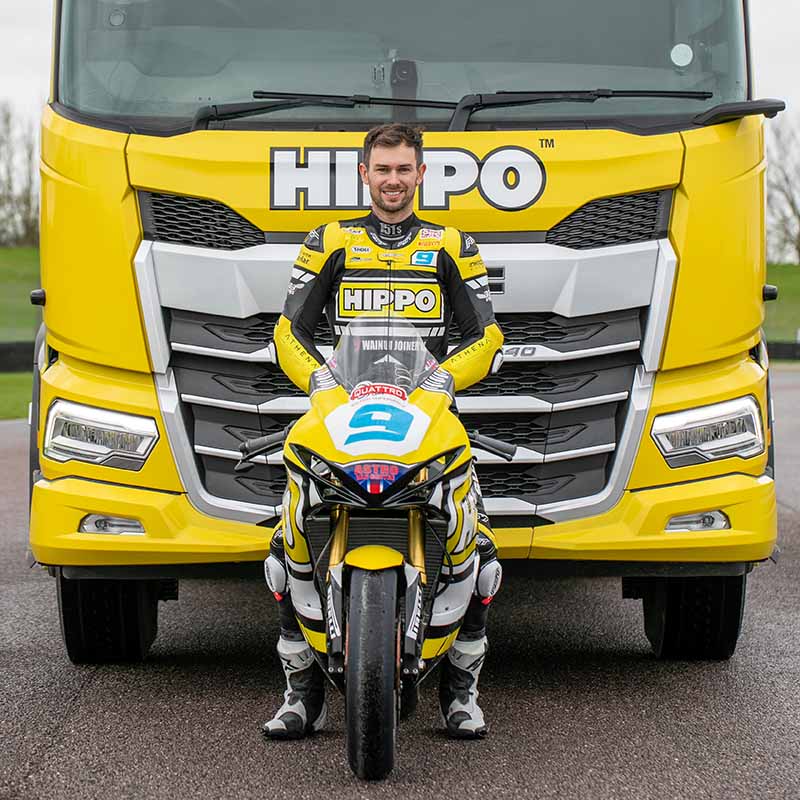 Shane Richardson sat on the HIPPO Suzuki superbike in front of a HIPPO lorry