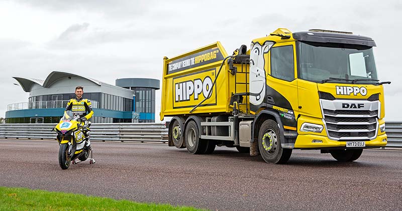 Shane Richardson sat on a HIPPO Suzuki parked next to a HIPPO lorry