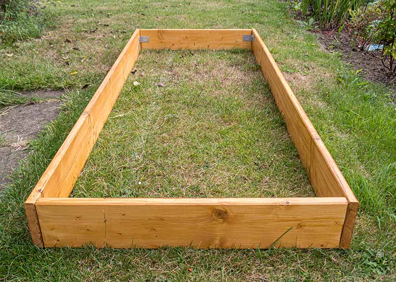 Building a new raised garden bed frame from timber