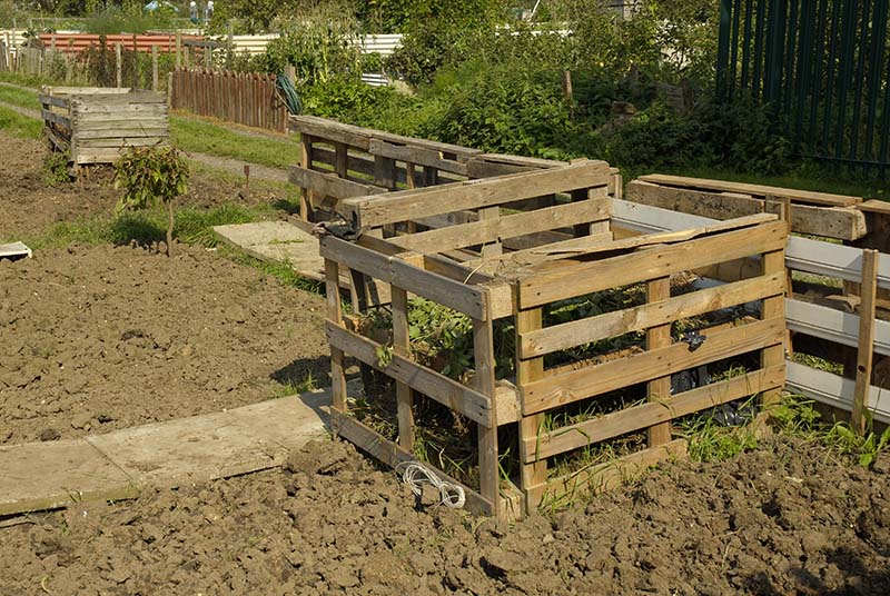 Pallets used for creating a compost in an allotment